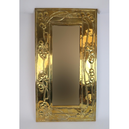 286 - A SCOTTISH ARTS AND CRAFTS BRASS FRAMED MIRROR