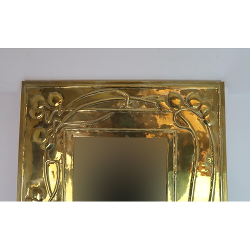 286 - A SCOTTISH ARTS AND CRAFTS BRASS FRAMED MIRROR