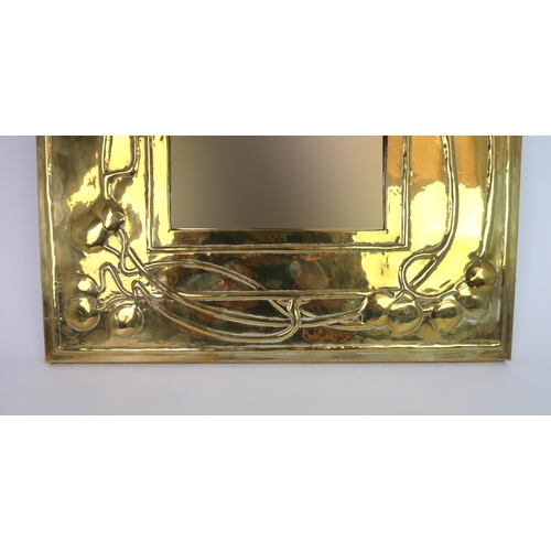 286 - A SCOTTISH ARTS AND CRAFTS BRASS FRAMED MIRROR