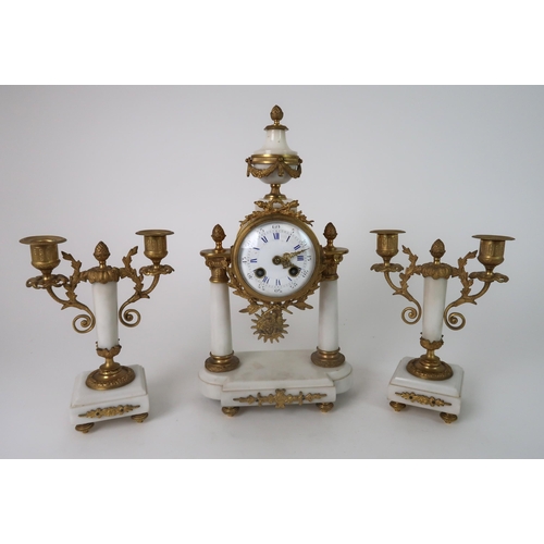 306 - A FRENCH ALABASTER AND ORMOLU MOUNTED CLOCK GARNITURE