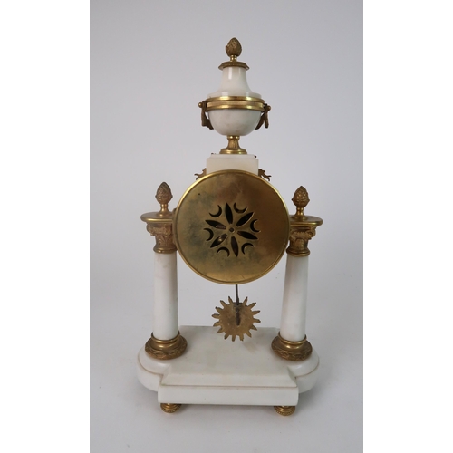 306 - A FRENCH ALABASTER AND ORMOLU MOUNTED CLOCK GARNITURE