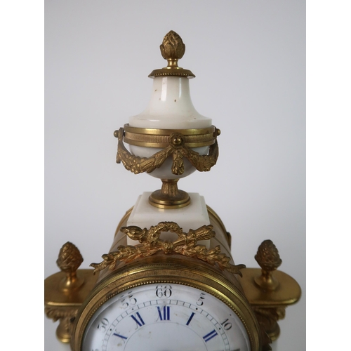 306 - A FRENCH ALABASTER AND ORMOLU MOUNTED CLOCK GARNITURE