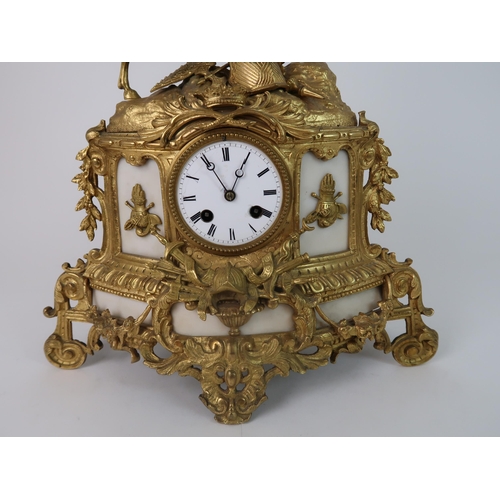 307 - A FRENCH ALABASTER AND ORMOLU MOUNTED MANTLE CLOCK