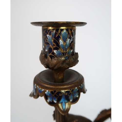 310 - A FRENCH BRONZE CHAMPLEVE ENAMEL CANDLESTICK