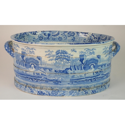 336 - A SPODE BLUE AND WHITE TRANSFER PRINTED CASTLE PATTERN FOOT BATH