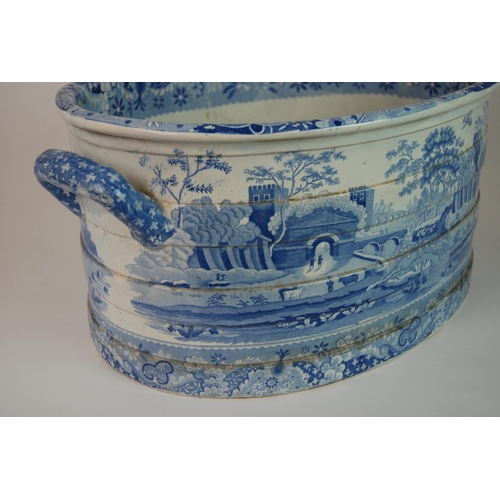 336 - A SPODE BLUE AND WHITE TRANSFER PRINTED CASTLE PATTERN FOOT BATH