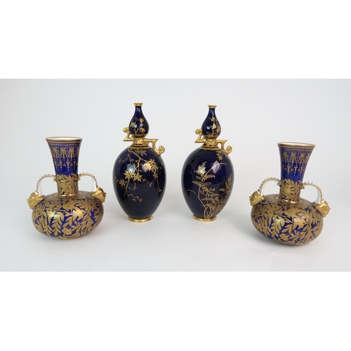 348 - A PAIR OF ROYAL CROWN DERBY TWO HANDLED VASES