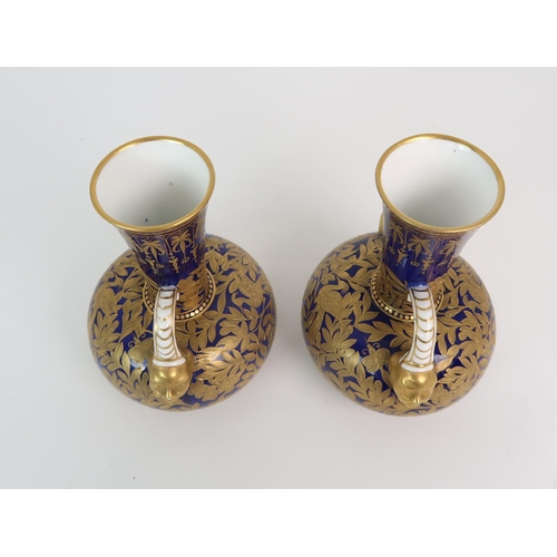 348 - A PAIR OF ROYAL CROWN DERBY TWO HANDLED VASES