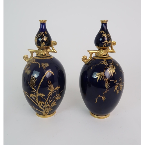 348 - A PAIR OF ROYAL CROWN DERBY TWO HANDLED VASES