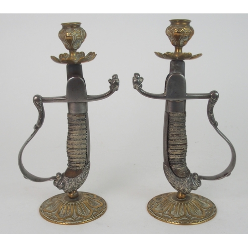 362 - A PAIR SWORD HILT CANDLESTICKS