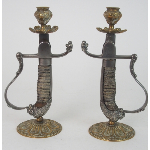 362 - A PAIR SWORD HILT CANDLESTICKS