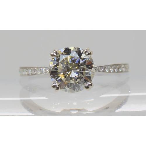 502 - AN 18CT WHITE GOLD DIAMOND SOLITAIRE RING