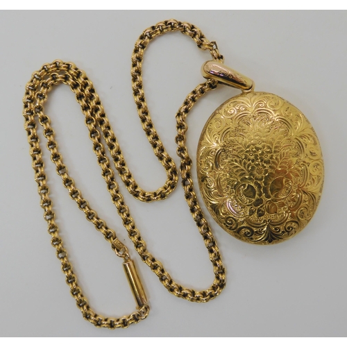 508 - A BRIGHT YELLOW METAL VICTORIAN LOCKET AND CHAIN