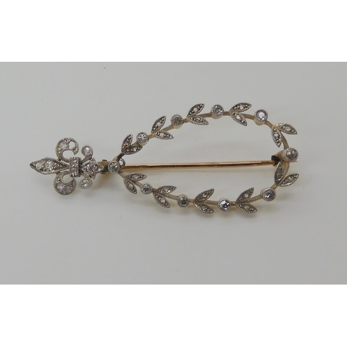 509 - AN EDWARDIAN DIAMOND BROOCH