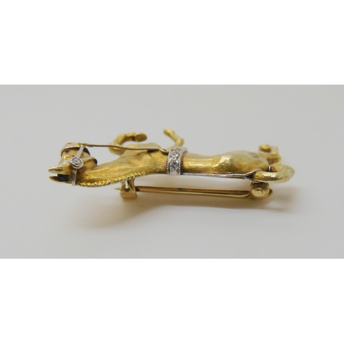 513 - A 14K YELLOW GOLD HORSE BROOCH