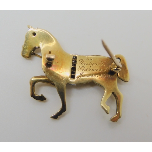 513 - A 14K YELLOW GOLD HORSE BROOCH