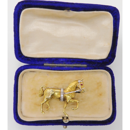 513 - A 14K YELLOW GOLD HORSE BROOCH