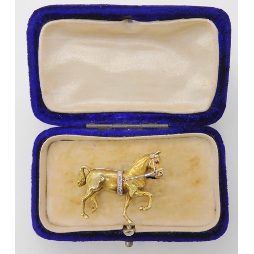 513 - A 14K YELLOW GOLD HORSE BROOCH