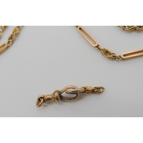 527 - A 9CT GOLD PIERCED BATON AND FANCY LINK GUARD CHAIN