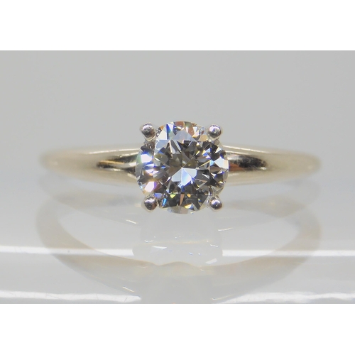 530 - A 14K WHITE GOLD DIAMOND SOLITAIRE