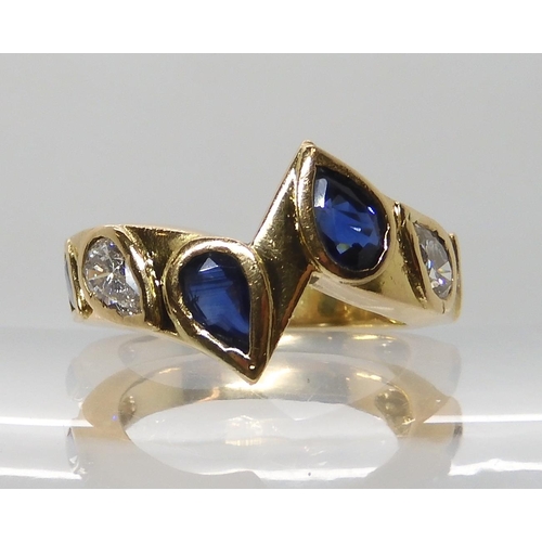 545 - AN UNUSUAL BESPOKE SAPPHIRE AND DIAMOND RING