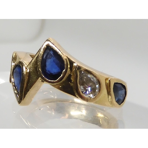 545 - AN UNUSUAL BESPOKE SAPPHIRE AND DIAMOND RING