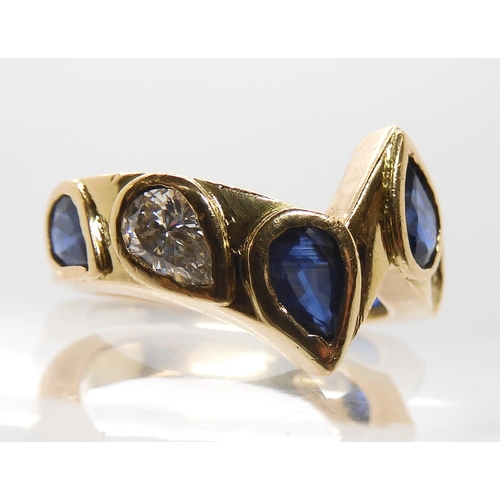 545 - AN UNUSUAL BESPOKE SAPPHIRE AND DIAMOND RING