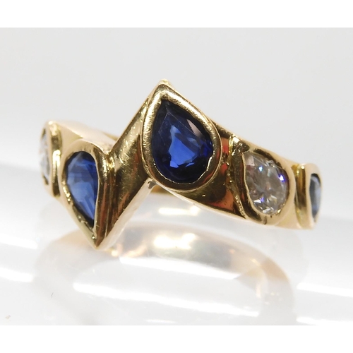 545 - AN UNUSUAL BESPOKE SAPPHIRE AND DIAMOND RING