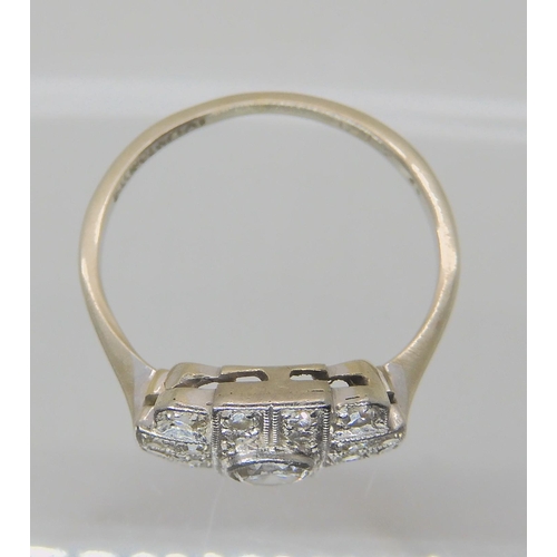 547 - A VINTAGE DIAMOND CLUSTER RING