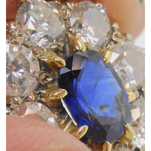 554 - A SUBSTANTIAL SAPPHIRE AND DIAMOND CLUSTER RING