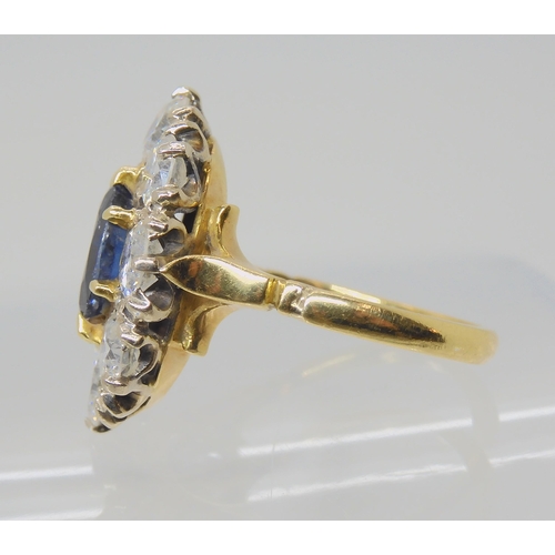 554 - A SUBSTANTIAL SAPPHIRE AND DIAMOND CLUSTER RING