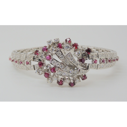 555 - AN 18CT WHITE GOLD RUBY AND DIAMOND BRACELET