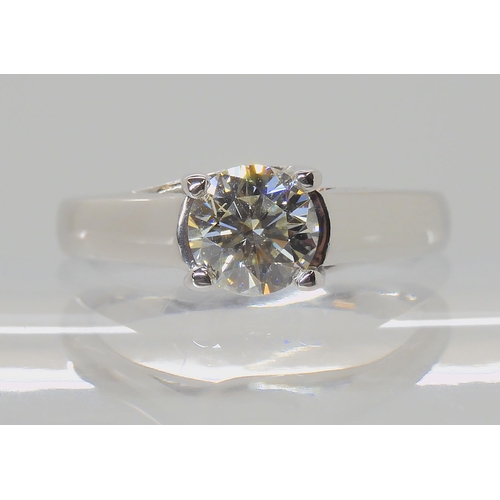 556 - AN 18CT WHITE GOLD DIAMOND SOLITAIRE RING