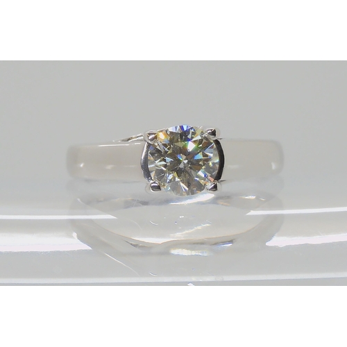 556 - AN 18CT WHITE GOLD DIAMOND SOLITAIRE RING