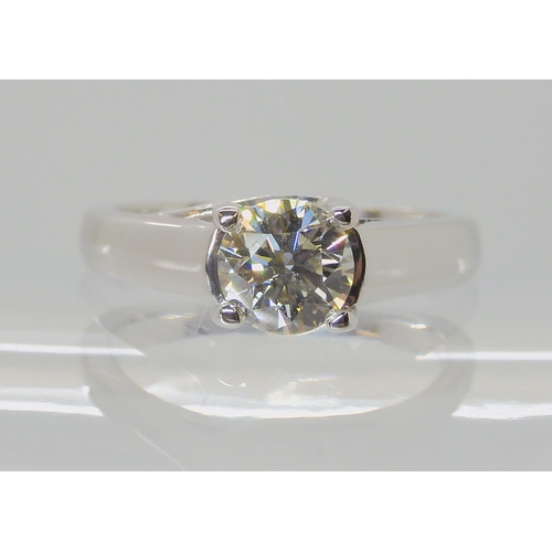 556 - AN 18CT WHITE GOLD DIAMOND SOLITAIRE RING