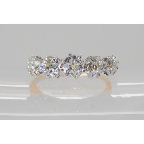 557 - A FIVE STONE DIAMOND RING