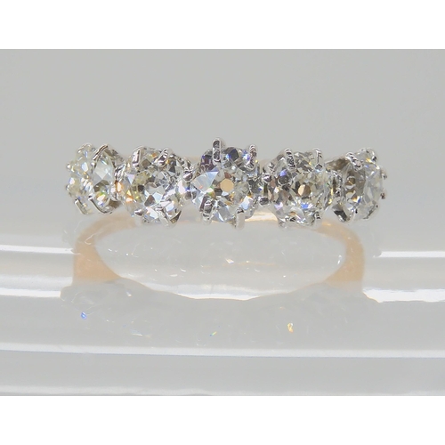 557 - A FIVE STONE DIAMOND RING