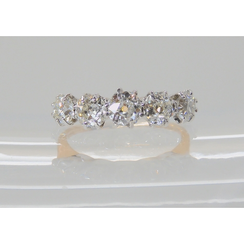 557 - A FIVE STONE DIAMOND RING