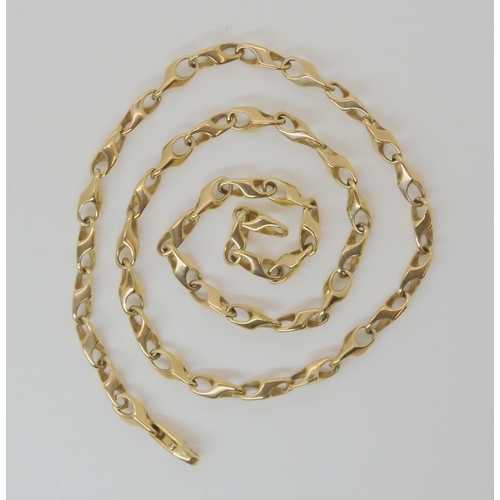 558 - A 9CT GOLD FANCY LINK CHAIN.