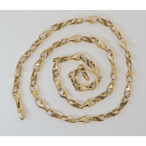 558 - A 9CT GOLD FANCY LINK CHAIN.