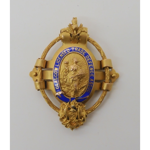 570 - A 14K GOLD GLASGOW TRADE DEFENCE ASSOCIATION MEDALLION