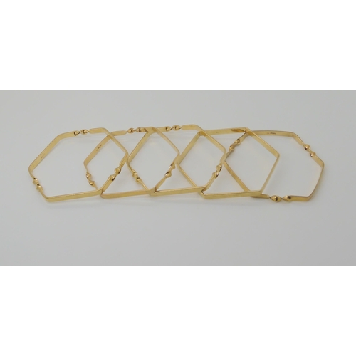 572 - FIVE 9CT GOLD HEXAGONAL SHAPED BANGLES