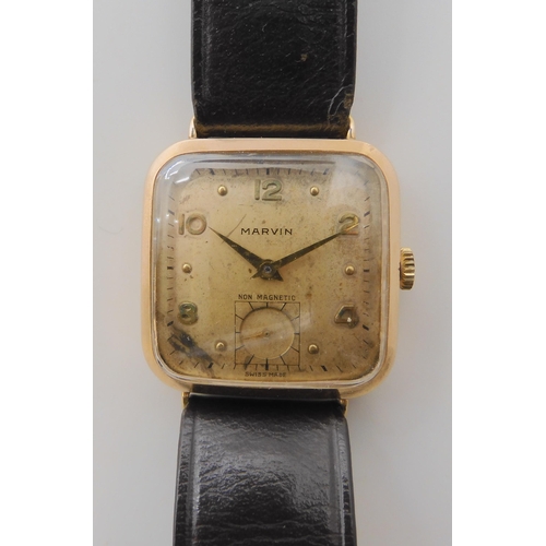 652 - A 9CT GOLD GENTS MARVIN WATCH