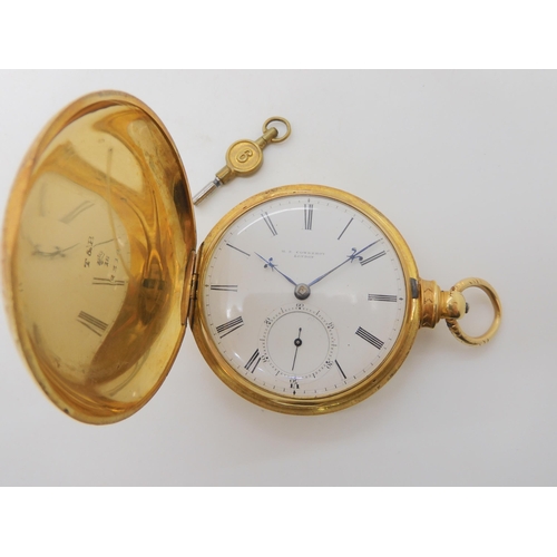 653 - AN 18CT GOLD FULL HUNTER POCKET WATCH WITH ENGRAVED DECORATION