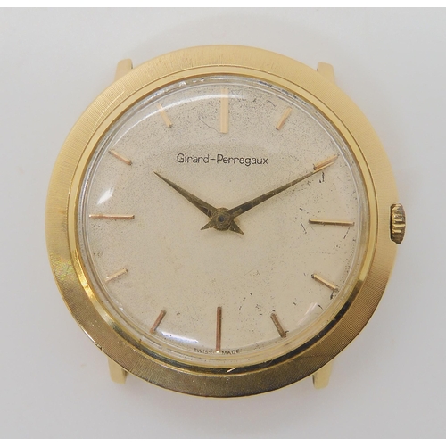 673 - A 14K GOLD GIRARD PERREGAUX WATCH HEAD