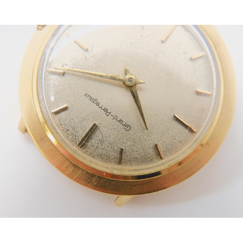 673 - A 14K GOLD GIRARD PERREGAUX WATCH HEAD