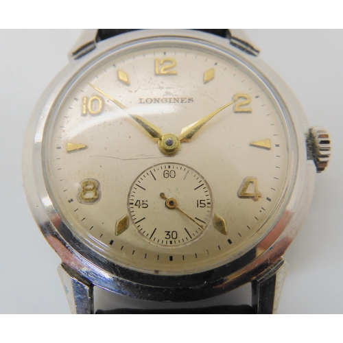 677 - A GENTS STAINLESS STEEL LONGINES WATCH