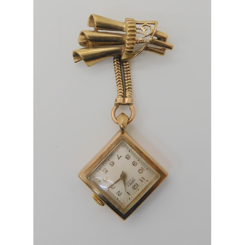 679 - A 9CT GOLD LADIES TREBEX BROOCH PENDANT WATCH