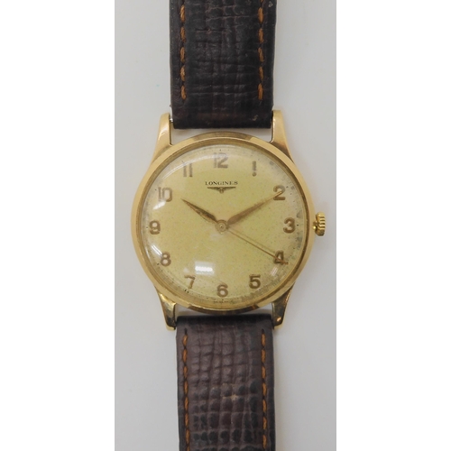 682 - A 9CT GOLD GENTS LONGINES WRISTWATCH