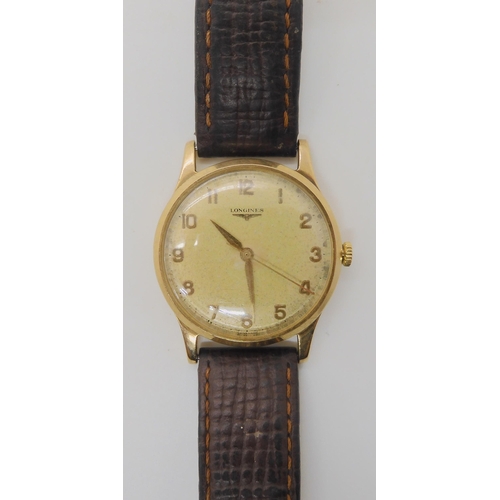 682 - A 9CT GOLD GENTS LONGINES WRISTWATCH